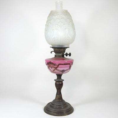 Lot 80 - An oil lamp