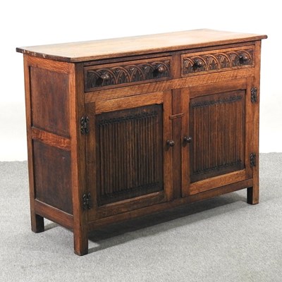 Lot 645 - An oak sideboard
