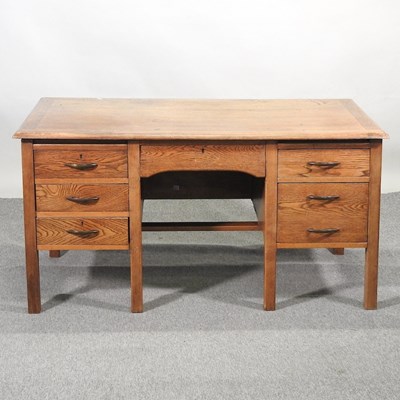Lot 410 - A 1920's oak desk