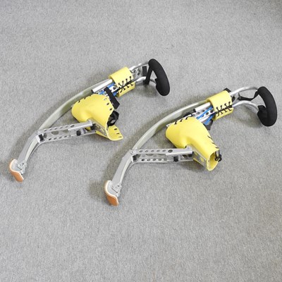 Lot 468 - A pair of sprung stilts