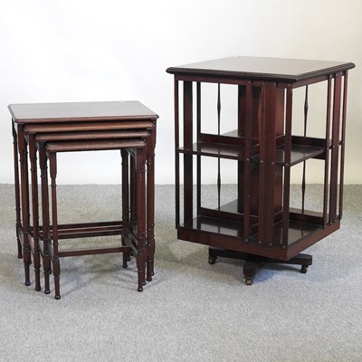 Lot 607 - A bookcase and nest of tables