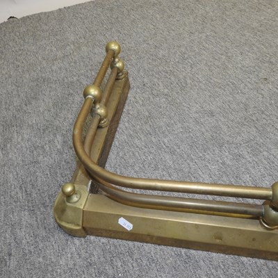 Lot 99 - A Victorian brass fender