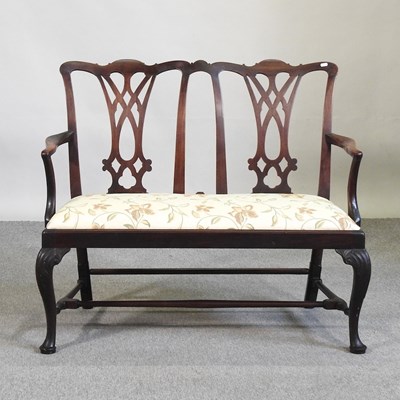 Lot 595 - A 19th century style chairback sofa