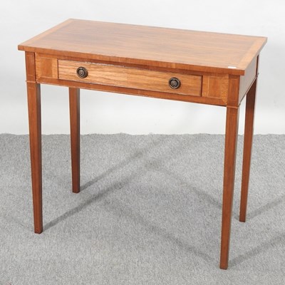 Lot 552 - A side table