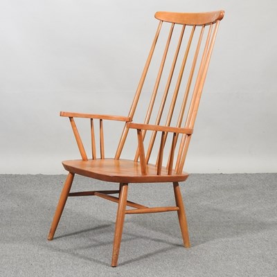 Lot 667 - A spindle back armchair