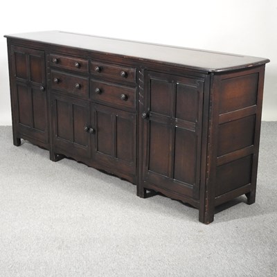 Lot 567 - An Ercol dresser base