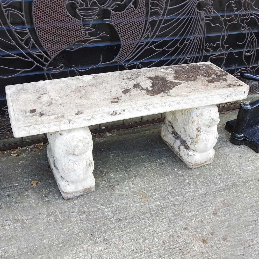 Lot 353 - A cast stone bench