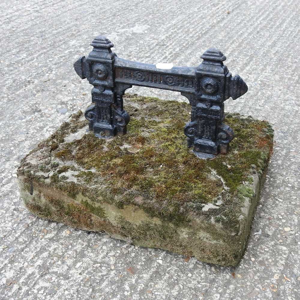 Lot 383 A cast iron boot scraper