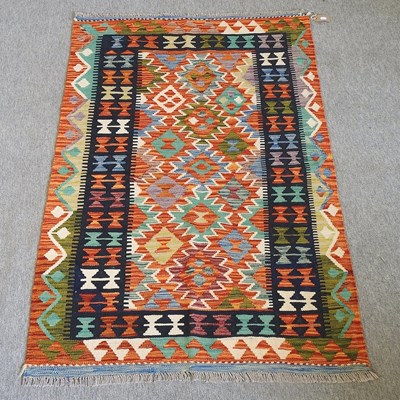 Lot 164 - A kelim rug