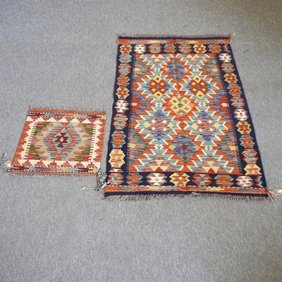 Lot 554 - A kelim rug and another