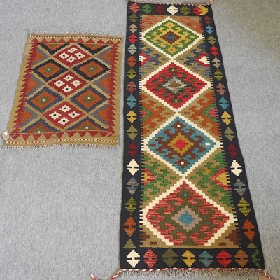 Lot 644 - A kelim runner and a rug