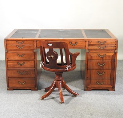 Lot 603 - A hardwood pedestal desk
