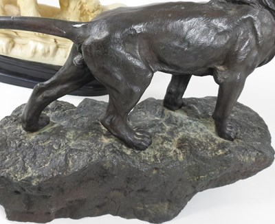 Lot 126 - A bronzed model of a lion