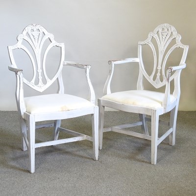 Lot 611 - A pair of white painted armchairs
