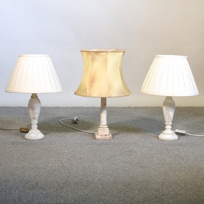 Lot 621 - A pair of marble table lamps