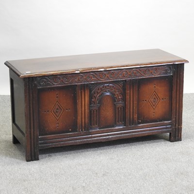 Lot 469 - A carved oak coffer