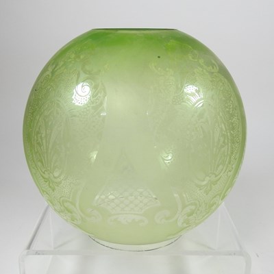 Lot 72 - A green etched glass oil lamp shade