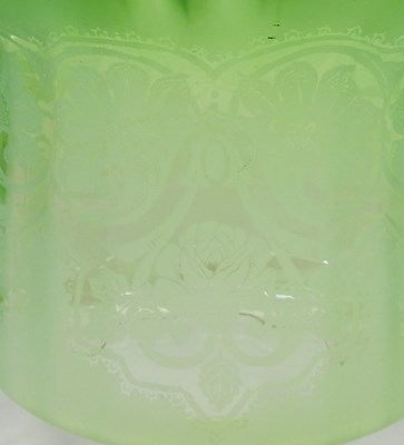 Lot 21 - A green glass oil lamp shade