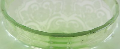 Lot 21 - A green glass oil lamp shade