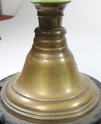 Lot 175 - An oil lamp, with a green glass reservoir