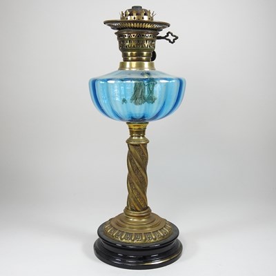 Lot 78 - An oil lamp, with a blue glass reservoir