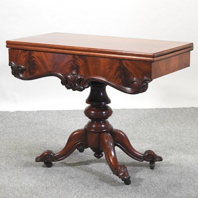 Lot 474 - A Victorian mahogany folding tea table