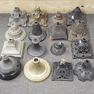 Lot 163 - A collection of cast iron oil lamp bases
