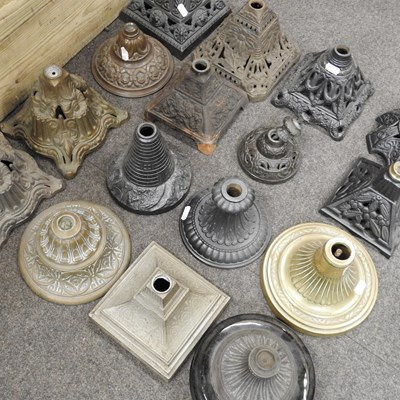 Lot 163 - A collection of cast iron oil lamp bases