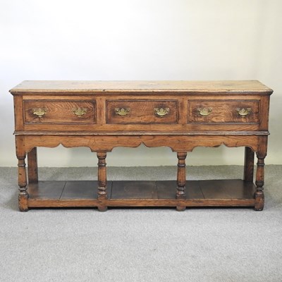 Lot 596 - An oak dresser base
