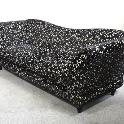 Lot 443 - A black upholstered sofa