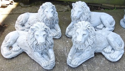 Lot 303 - Two pairs of lion statues