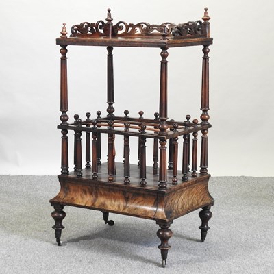 Lot 483 - A Victorian walnut canterbury whatnot