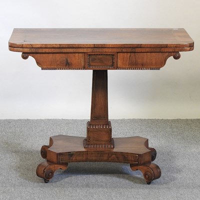 Lot 635 - A rosewood folding card table