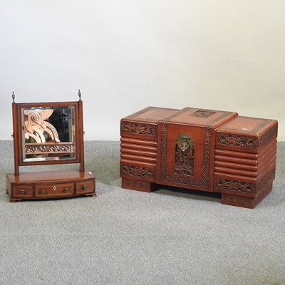 Lot 569 - A hardwood trunk and mirror