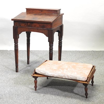 Lot 484 - An early 20th century walnut desk, together with a bed tray