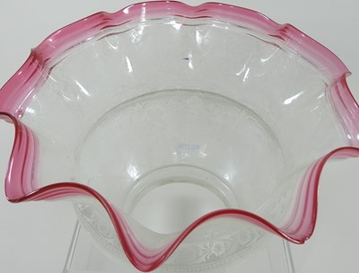 Lot 76 - A clear and pink oil lamp shade