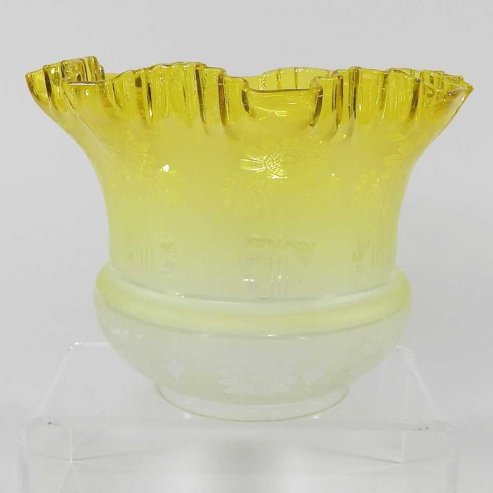 Lot 82 - A yellow oil lamp shade