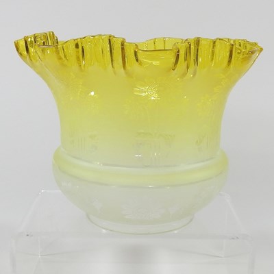 Lot 82 - A yellow oil lamp shade