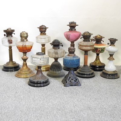 Lot 180 - Ten oil lamp bases