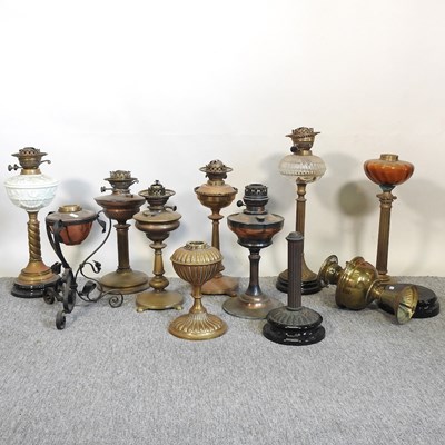 Lot 172 - A collection of oil lamp bases