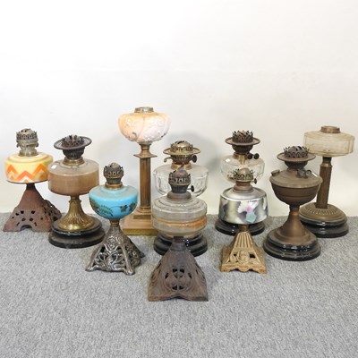 Lot 171 - A collection of  oil lamp bases