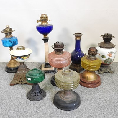 Lot 156 - A collection of oil lamp bases