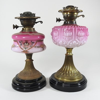 Lot 182 - Two brass and pink oil lamp bases