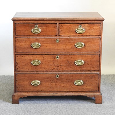 Lot 429 - A George III oak chest