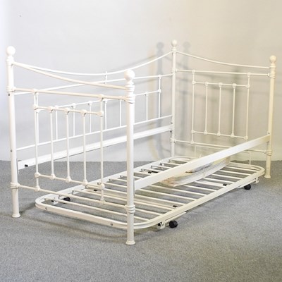 Lot 375 - A cream painted metal day bed