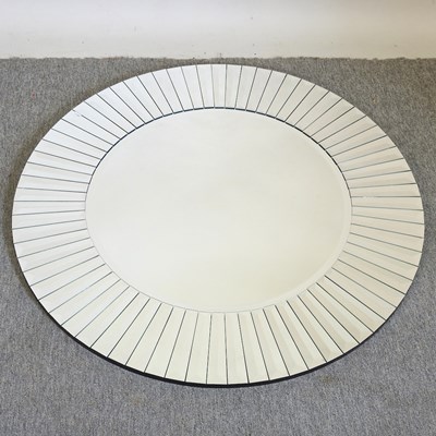 Lot 620 - A wall mirror