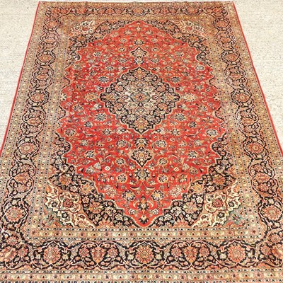 Lot 520 - A Persian Kashan carpet