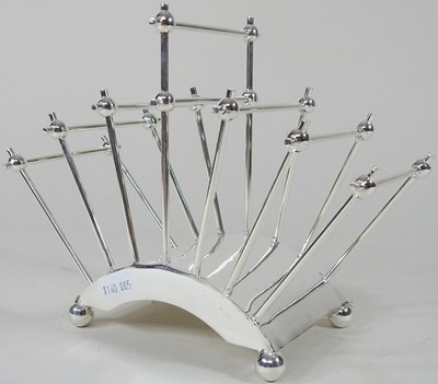 Lot 536 - A Christopher Dresser style toast rack