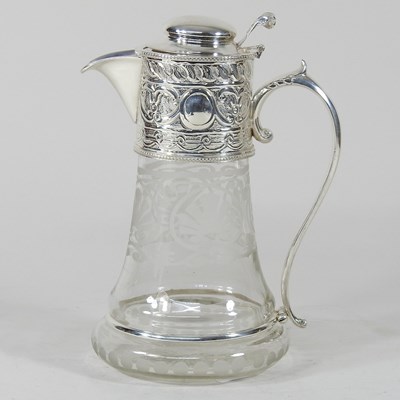 Lot 420 - A claret jug