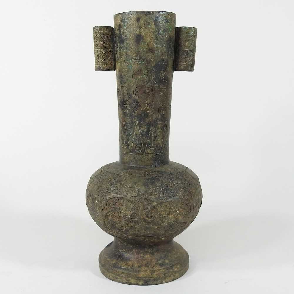 Lot 660 - A bronze vase